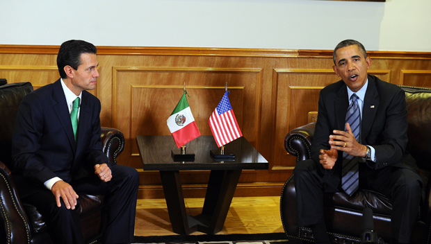 US President Barack Obama holds a bilateral meeting with Mexican President Enrique Pena Nieto (L) at the Palacio de Gobierno del Estado de Mexico in Toluca, Mexico, on February 19, 2014. 