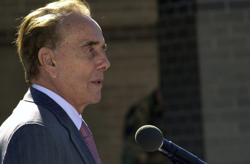 Former U.S. Senator Robert J. Dole gives a speech during the dedication ceremony of the Robert J. Dole Community Center at McConnell Air Force Base, Kan., on Oct. 29, 2004. 