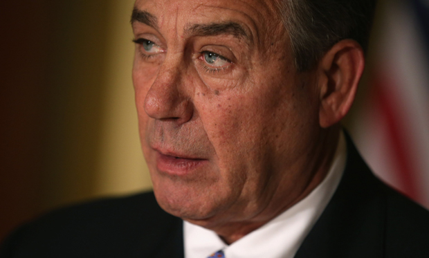 Speaker of the House John Boehner (R-OH) talks with reporters in his office in the U.S. Capitol.