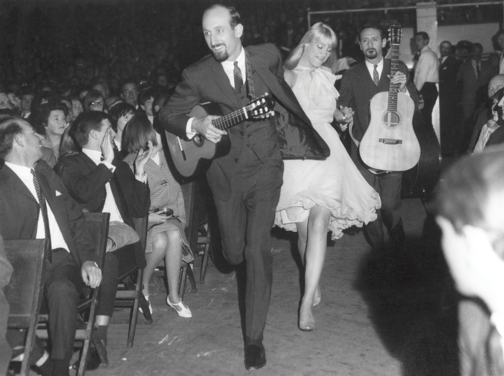 The trio rushes onstage, hand in hand. "We always came onstage this way, sometimes running right through the audience," the trio says. 