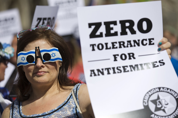 Jewish groups protest outside the Royal Courts of Justice in London on August 31, 2014, as they call for "Zero Tolerance for Anti-Semitism". Jewish groups demonstrated outside the British High Court as latest figures published by the Community Security Trust reported a spike in anti-semitic attacks on people and property in the UK following the latest outbreak of violence between Israel and Palestinians in Gaza.     