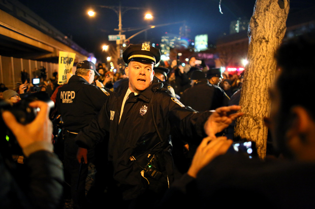 Police clash with protesters on the West Side Highway December 3, 2014 in New York. Protests began after a Grand Jury decided to not indict officer Daniel Pantaleo. Eric Garner died after being put in a chokehold by Pantaleo on July 17, 2014. 