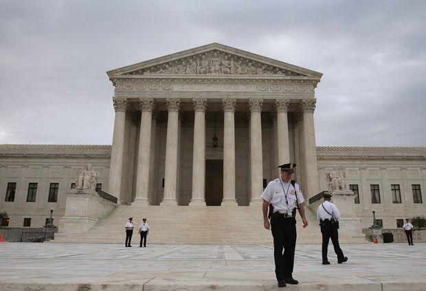 Police stand in front of the U.S. Supreme Court in Washington, D.C.