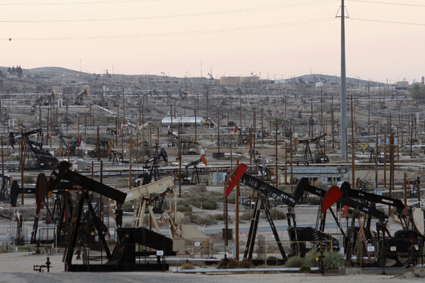 Pump jacks and wells are seen in an oil field on the Monterey Shale formation where gas and oil extraction using hydraulic fracturing, or fracking, is common.