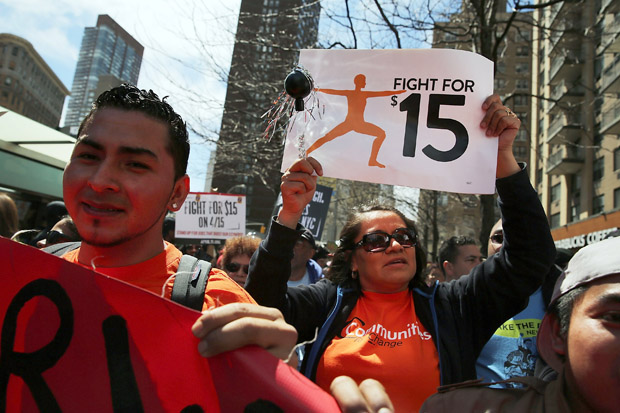 Low wage workers, many in the fast-food industry, join with supporters to demand a minimum wage of $15 an hour on April 15, 2015 in New York City