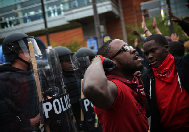 Protesters stand off with police during a march in honor of Freddie Gray on April 25, 2015 in Baltimore, Maryland.