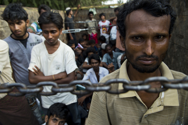 Rohingya men from Myanmar are transported after they were rescued May 20 off the coast of Indonesia. 