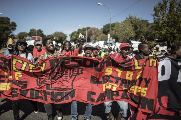 Hundreds of demonstrators march May 15 to the French Consulate to demand the French government and French company Engie stop supporting coal in South Africa and support sustainable renewable energy instead.       