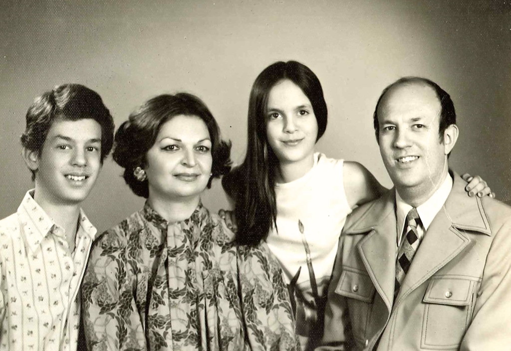 Cyrus Copeland, far left, and his family pose in a family photograph. 