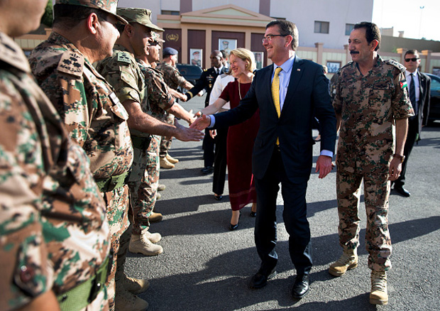 U.S. Defense Secretary Ash Carter is greeted July 22 by Gen. Mashal al-Zaben (R) and members of the Jordanian Armed Forces as he arrives at the Jordan Armed Forces General Headquarters in Amman, Jordan. 