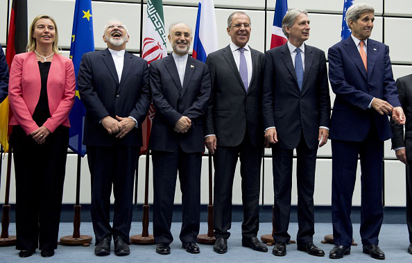 From left to right: European Union High Representative for Foreign Affairs and Security Policy Federica Mogherini, Iranian Foreign Minister Mohammad Javad Zarif, Head of the Iranian Atomic Energy Organization Ali Akbar Salehi, Russian Foreign Minister Sergey Lavrov, British Foreign Secretary Philip Hammond and U.S. Secretary of State John Kerry pose after reaching a nuclear agreement July 14 at the United Nations building in Vienna, Austria. 