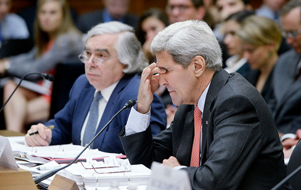 Secretary of State John Kerry testifies as Secretary of Energy Ernest Moniz looks on July 28 at a hearing before the House Foreign Affairs Committee in Washington, D.C.  