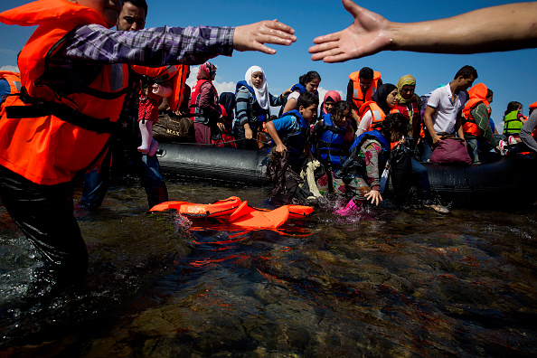 Refugees come ashore Sep. 8 near the village of Skala Sikamineas in Lesbos, Greece.   