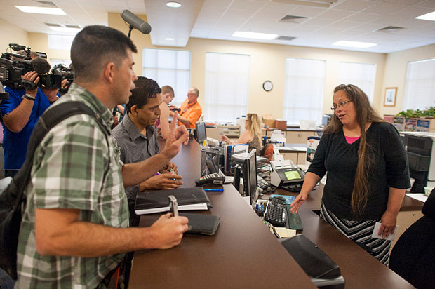 Robbie Blankenship stands next to his partner of 20 years, Jesse Cruz on Sept. 2 as they try to get a marriage license from Rowan County Clerk of Courts Kim Davis at the County Clerks Office.  