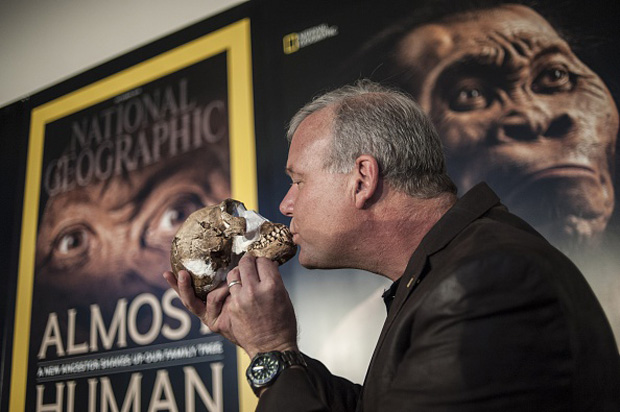 Professor Lee Berger kisses the skull of a Homo Naledi , a newly-discovered human ancestor, during the unveiling of the discovery Sept. 10 in Maropeng.  