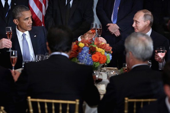 U.S. President Barack Obama (L) and Russian President Valdimir Putin toast Sept. 28 during a luncheon hosted by United Nations Secretary-General Ban Ki-moon during the 70th annual UN General Assembly at the UN headquarters  in New York City. 