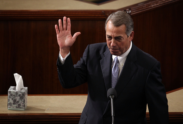 John Boehner waves Thursday after giving his farewell speech as speaker of the House.