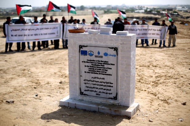 This 2014 file photo shows the first stone to mark the start of the construction of a major seawater desalination plant, which has a capacity of 6000 m3 of water per day, in the central Gaza Strip.  