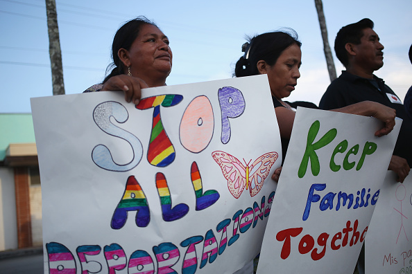 Protesters gather July 9 in Homestead, Fla., the night before the 5th Circuit Court of Appeals heard arguments about the Obama administration's executive actions on immigration. The court issued a ruling against the White House on Monday. 