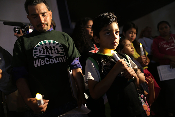 Bryan Gonzalez, whose family is originally from Mexico, attends a vigil with others to protest against the deportation of undocumented immigrants on Jan. 6 in Homestead, Florida. 