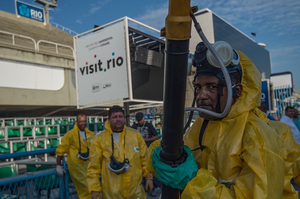 Municipal agents spray against at the Sambadrome in Rio de Janeiro on January 26. Brazil mobilized more than 200,000 troops to go "house to house" in the battle against Zika-carrying mosquitoes.