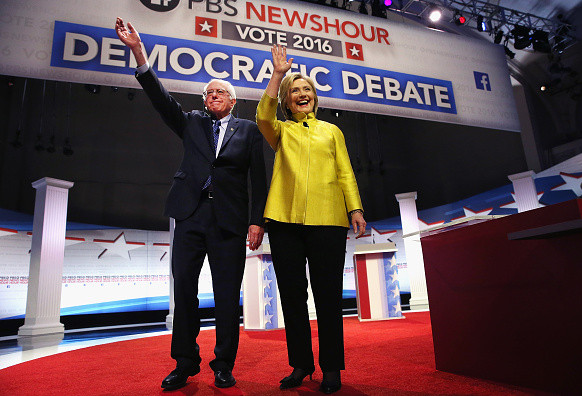 Democratic presidential candidate Senator Bernie Sanders (L) and Hillary Clinton participate in the PBS NewsHour Democratic presidential candidate debate at the University of Wisconsin-Milwaukee on February 11 in Milwaukee, Wisconsin.