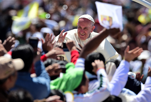 Pope Francis waves from the popemobile in San Cristobal de Las Casas on February 15. Thousands of indigenous Mexicans flocked on Monday to a field in the southern state of Chiapas to attend Pope Francis' mass.
