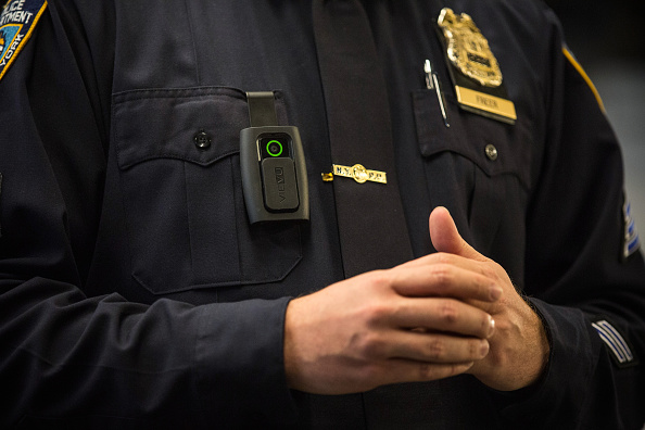 New York Police Department (NYPD) Sergeant Joseph Freer demonstrates how to use and operate a body camera during a media press conference on December 3, 2014 in New York City. 