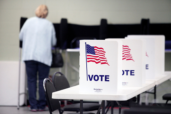 A resident votes in the Michigan primary March 8 in Detroit, Michigan. On Tuesday, Mississippi and Idaho also held primaries and Hawaii held a caucus.