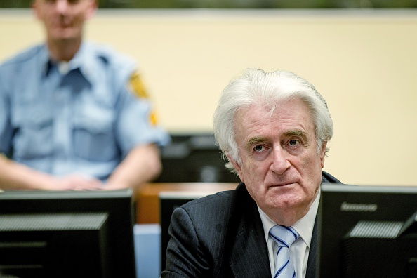 Bosnian Serb wartime leader Radovan Karadzic sits in the courtroom for the reading of his verdict at the International Criminal Tribunal for Former Yugoslavia (ICTY) in The Hague, on March 24.
The former Bosnian-Serbs leader is indicted for genocide, crimes against humanity and war crimes.
