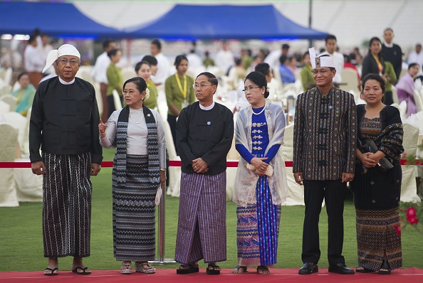 Myanmar's new president Htin Kyaw (L) and his wife Su Su Lwin (2L), with the first and second vice presidents and their wives, wait at the start of a dinner reception following a swearing-in ceremony in the capital Naypyidaw on March 30.