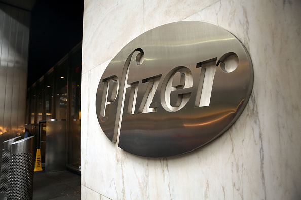Pfizer's corporate headquarters stand in midtown Manhattan on November 12, 2015 in New York City. The drug company had planned a merger with Ireland-based Allergan that would have lowered its U.S. tax bill, but new tax rules led the companies to back out of the deal on April 6.