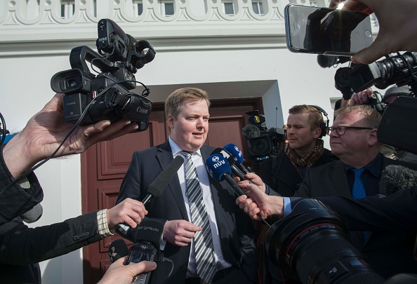Iceland's prime minister Sigmundur David Gunnlaugsson speaks to journalists as he hands in what was thought to be his resignation to Iceland's President Olafur Ragnar Grimsson in Reykjavik, on April 7. Since, he has said he was not actually resigning and will just be "stepping aside."