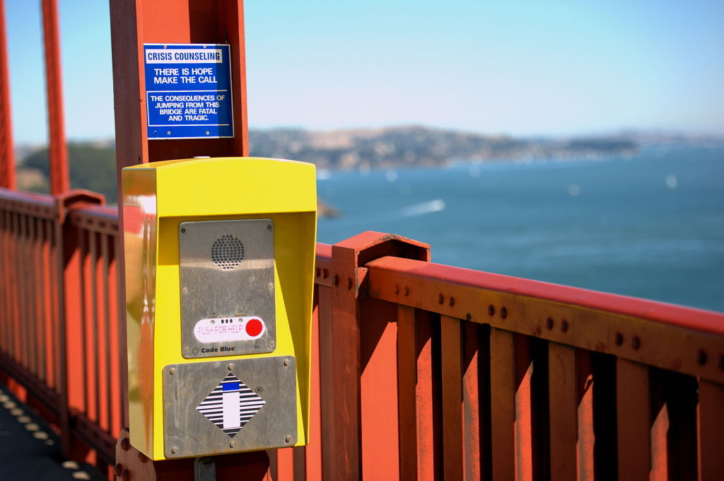 A suicide-prevention sign and help line on the Golden Gate Bridge.