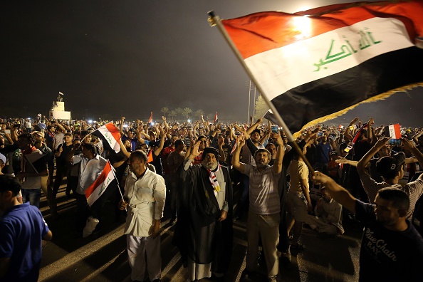 Supporters of cleric Moqtada al-Sadr gather in the courtyard of celebrations after breaking into Baghdad's heavily fortified "Green Zone" on April 30.
Thousands of angry protesters stormed the parliament building after lawmakers again failed to approve new ministers.
