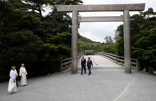 U.S. President Barack Obama (2nd R) and Japan's Prime Minister Shinzo Abe are welcomed by Shinto priests as they visit Ise-Jingu Shrine in the city of Ise on May 26 on the first day of the G7 leaders summit.