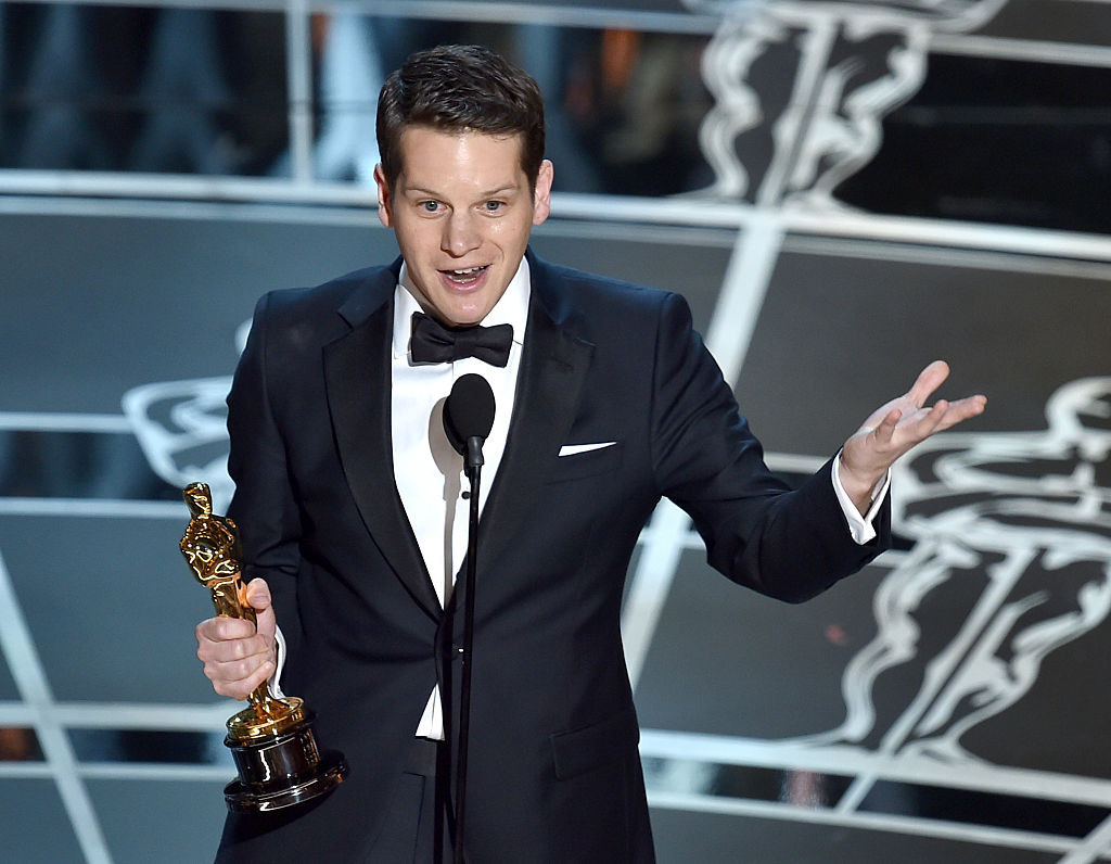 Screenwriter Graham Moore accepts the Best Adapted Screenplay Award for "The Imitation Game" onstage during the 87th Annual Academy Awards at Dolby Theatre on February 22, 2015 in Hollywood, California. 