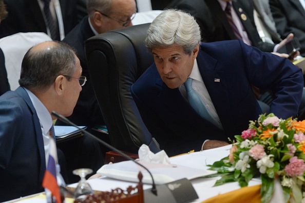 U.S. Secretary of State John Kerry (R) chats with Russian Foreign Minister Sergey Lavrov during the East Asia Foreign Ministers' meeting at the Association of Southeast Asian Nations (ASEAN) annual ministerial meeting in Vientiane on July 26.