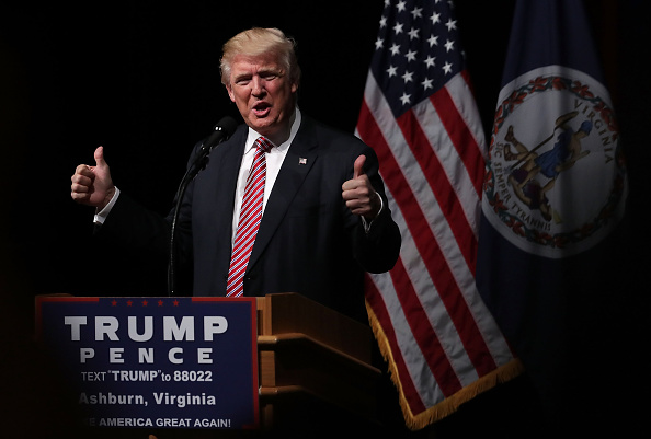 Republican presidential nominee Donald Trump holds two thumbs up during a campaign event at Briar Woods High School August 2 in Ashburn, Virginia.