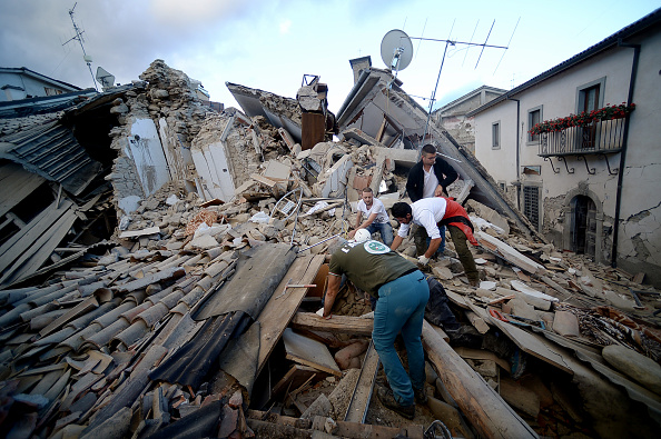Residents of Amatrice, Italy search for victims in the rubble after a powerful 6.2-magnitude earthquake hit on August 24, 2016.