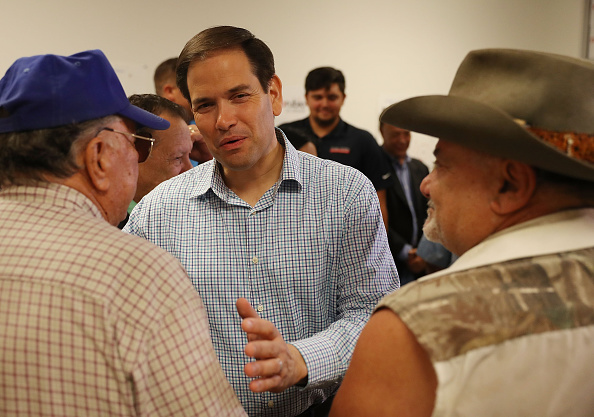 Florida Sen. Marco Rubio speaks with supporters as he stops to thank volunteers at a phone bank on the final day before the Florida primary election on August 29 in Miami, Florida. Rubio won over Carlos Beruff on Tuesday.