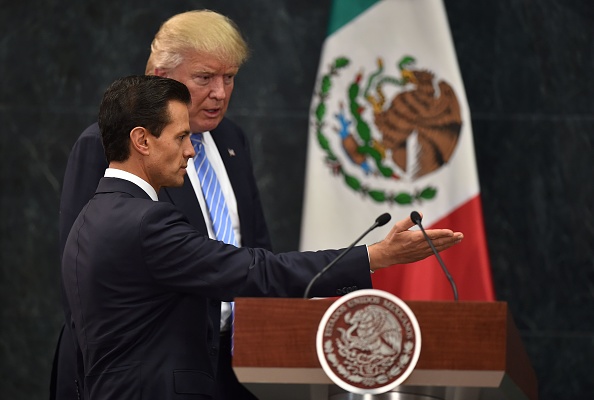 U.S. presidential candidate Donald Trump (R) and Mexican president Enrique Pena Nieto prepare to deliver a joint press conference in Mexico City on August 31.