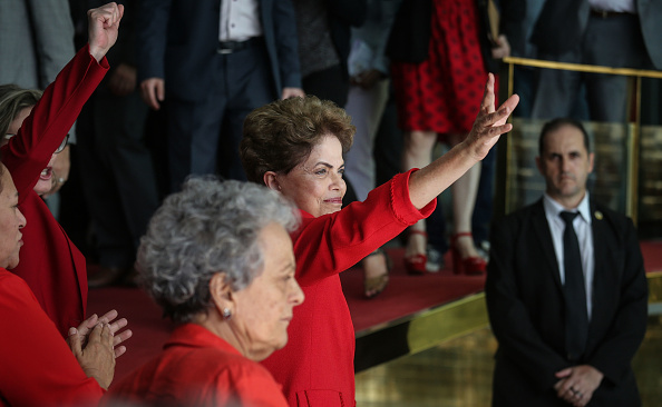 Impeached President Dilma Rousseff (C) waves to the crowd before delivering her farewell address in Alvorado Palace on August 31 in Brasilia, Brazil.