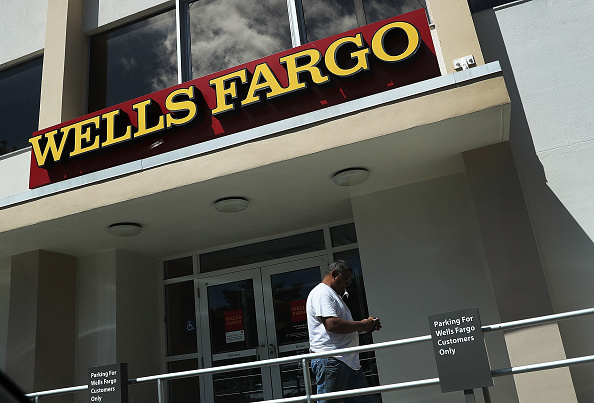 A Wells Fargo sign is seen on the exterior of one of their bank branches Sept. 9 in Miami, Florida.  Reports indicate that more than 5,000 Wells Fargo employees have been fired as a result of a scandal involving employees that secretly set up new fake bank and credit card accounts in order to meet sales targets. 