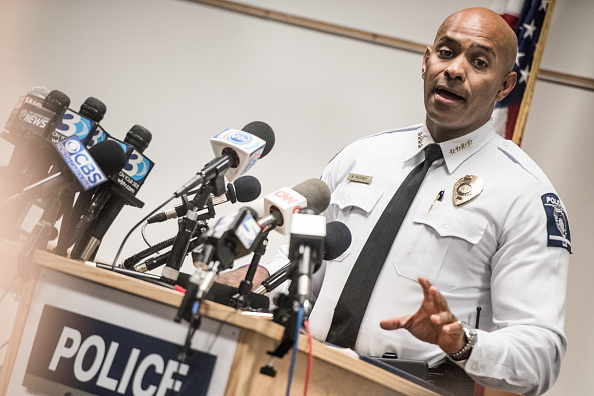 Kerr Putney, chief of the Charlotte-Mecklenburg police, talks with the media concerning the release of police video from a recent officer involved fatal shooting at the Charlotte Police Department West Service Center September 24 in Charlotte, North Carolina.