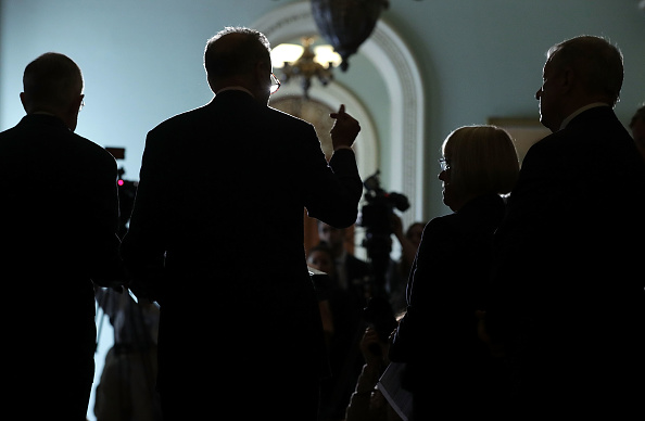 U.S. Senate Minority Leader Sen. Harry Reid (D-NV), Sen. Charles Schumer (D-NY), Sen. Patty Murray (D-WA) and Senate Minority Whip Sen. Richard Durbin (D-IL) (L-R) speak to members of the media during a news briefing at the Capitol September 27, in Washington, DC.
