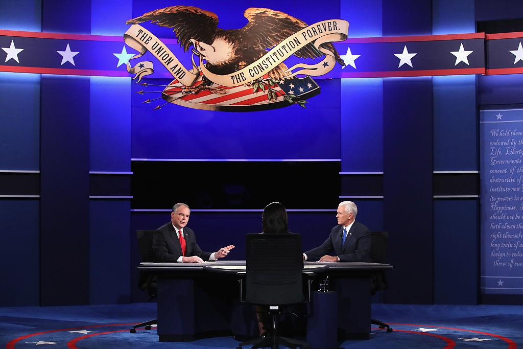 Democratic vice presidential nominee Tim Kaine (L) and Republican vice presidential nominee Mike Pence (R) debate as moderator Elaine Quijano (C) listens during the Vice Presidential Debate at Longwood University on October 4, 2016 in Farmville, Virginia.