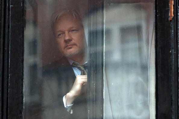 LONDON, ENGLAND - FEBRUARY 05:  Wikileaks founder Julian Assange prepares to speak from the balcony of the Ecuadorian embassy where  he continues to seek asylum following an extradition request from Sweden in 2012, on February 5, 2016 in London, England. 