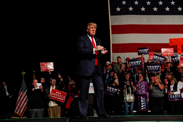Republican presidential candidate Donald Trump walks on stage at a rally Oct. 15 at Cross Insurance Center in Bangor, Maine. 