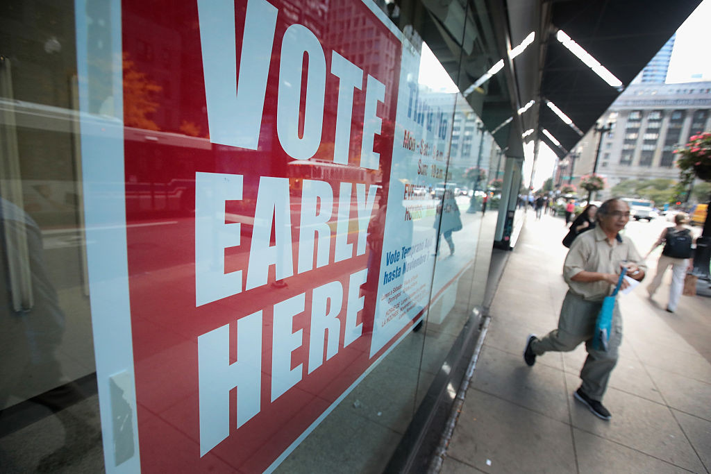 A sign alerts residents to an early voting site where they can cast ballots for the November 8 election, on October 18, 2016 in Chicago, Illinois. 